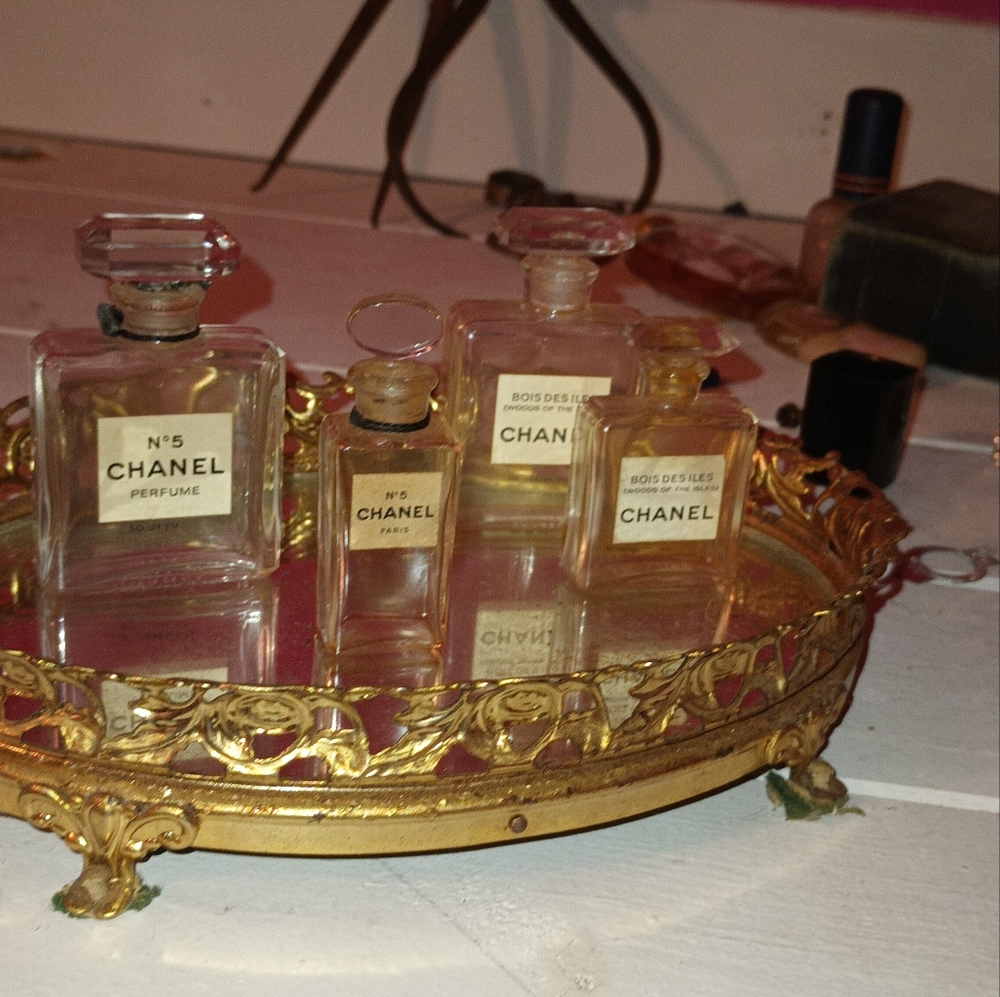 Vintage collectable chanel bottles with mirrored tray